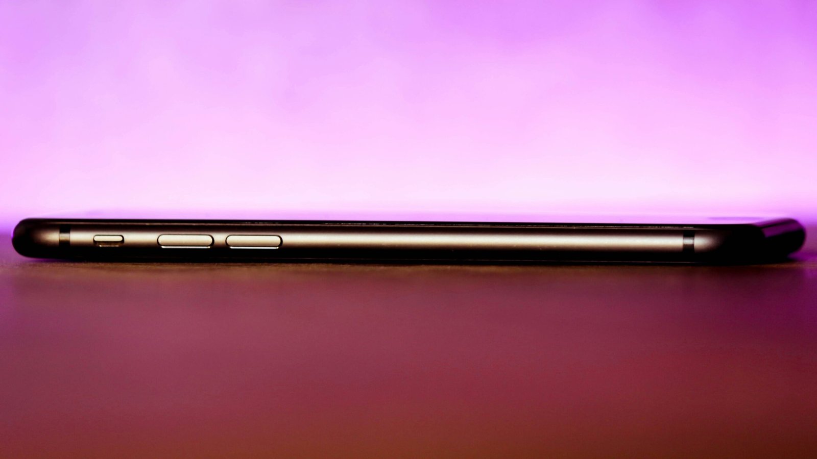 a close up of a cell phone on a table